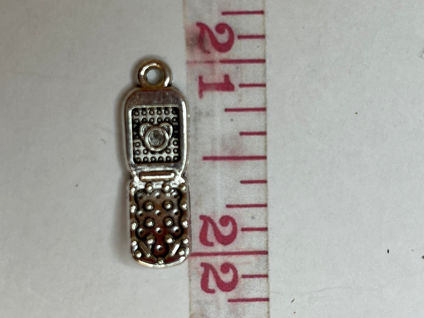 Silver phone charm
