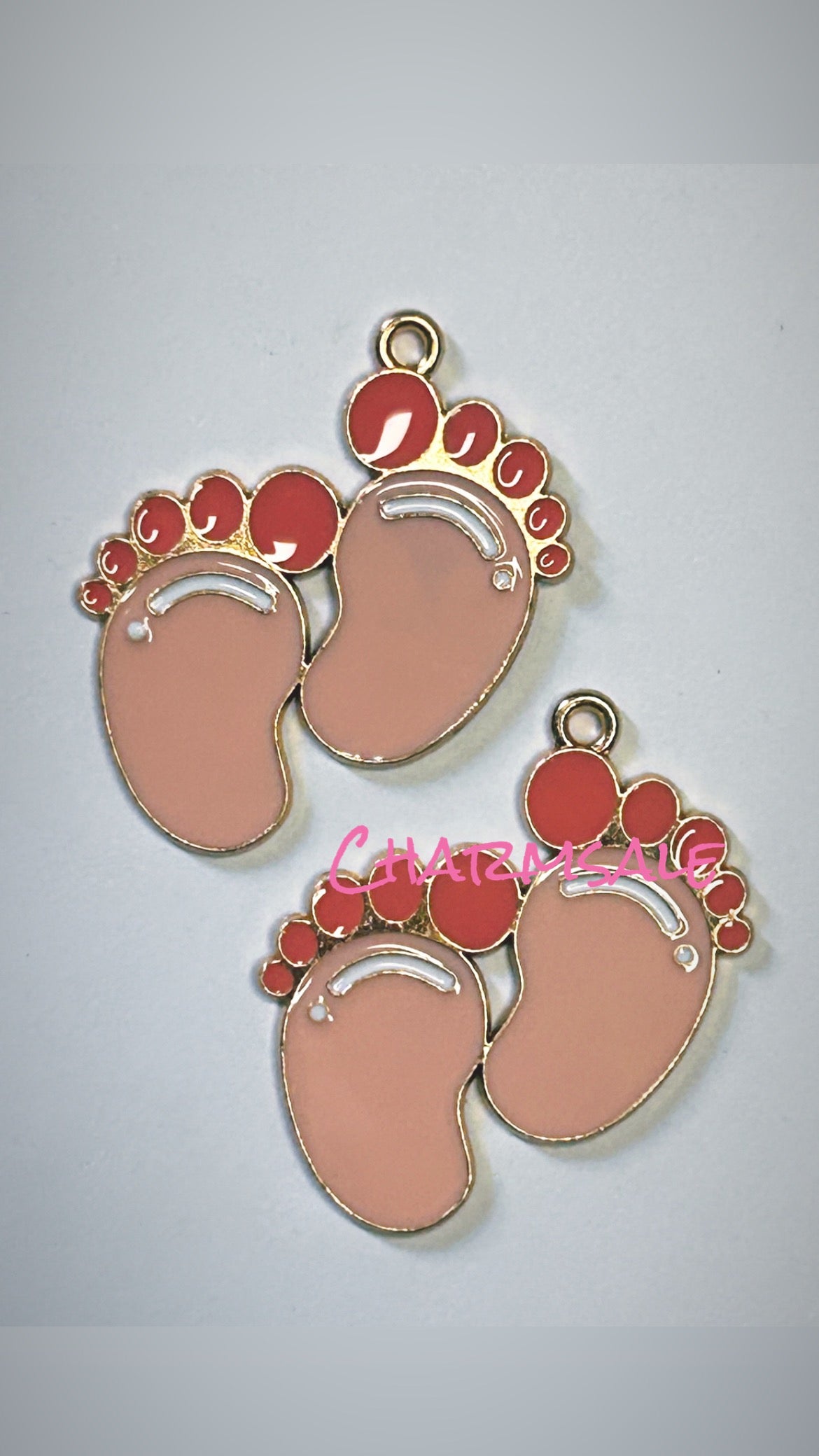 Pink baby feet gold backs