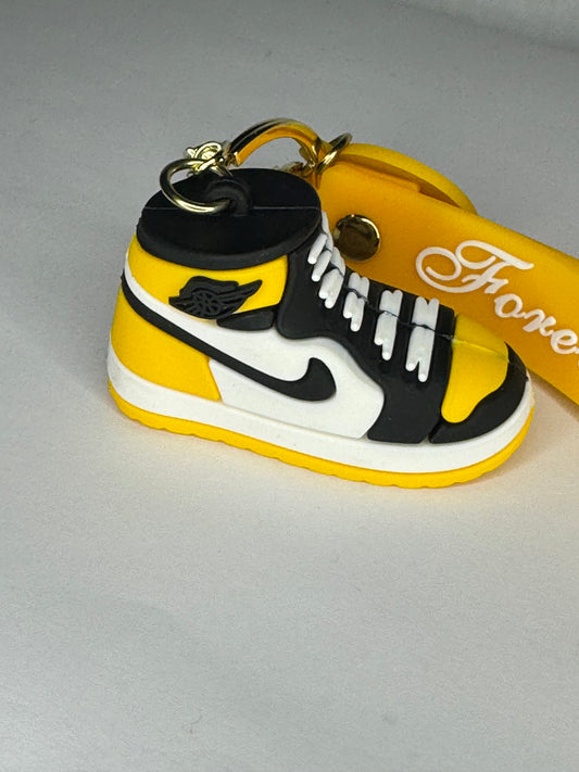 ￼ yellow Nike keychain