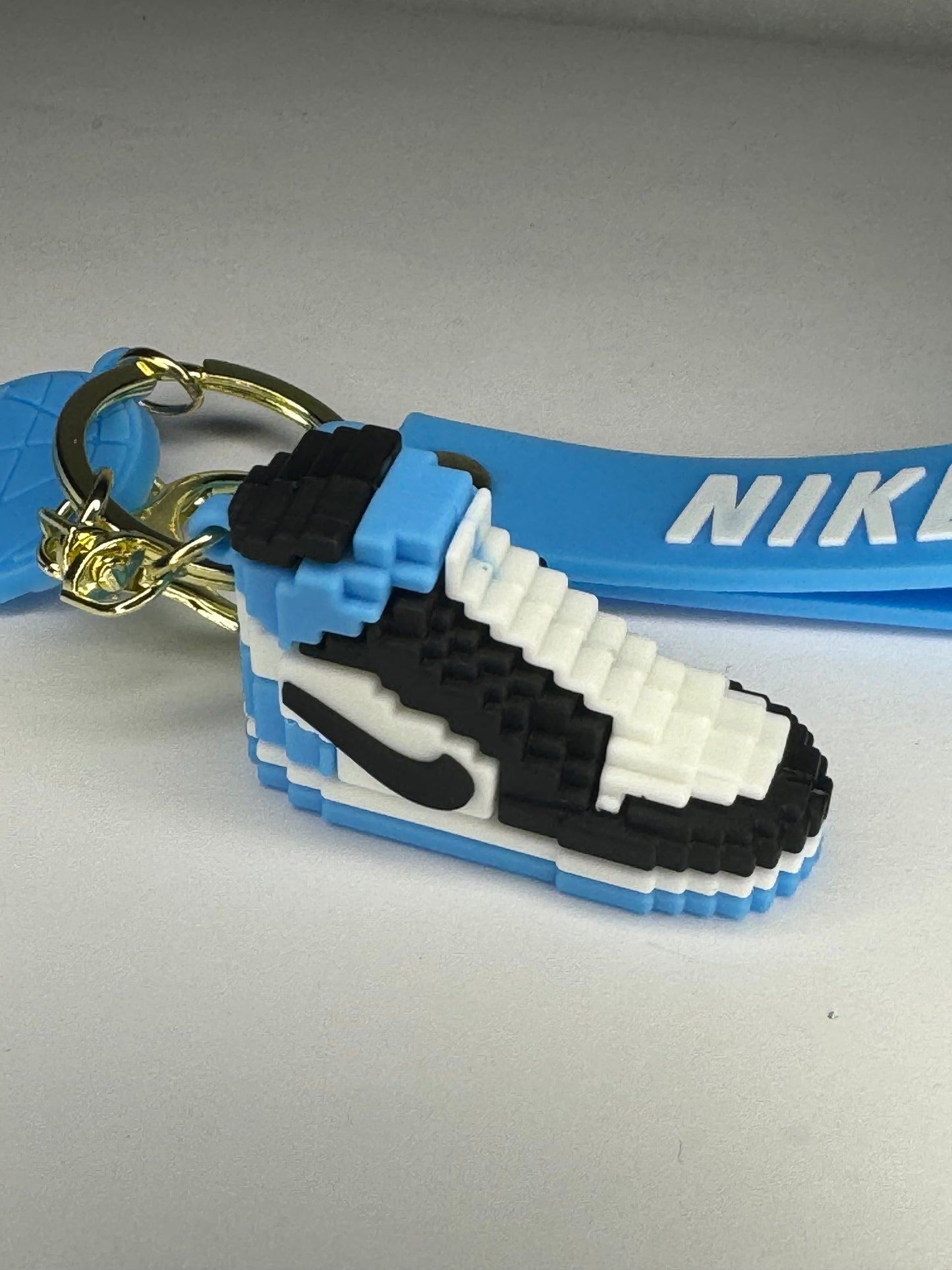 Blue Nike keychain