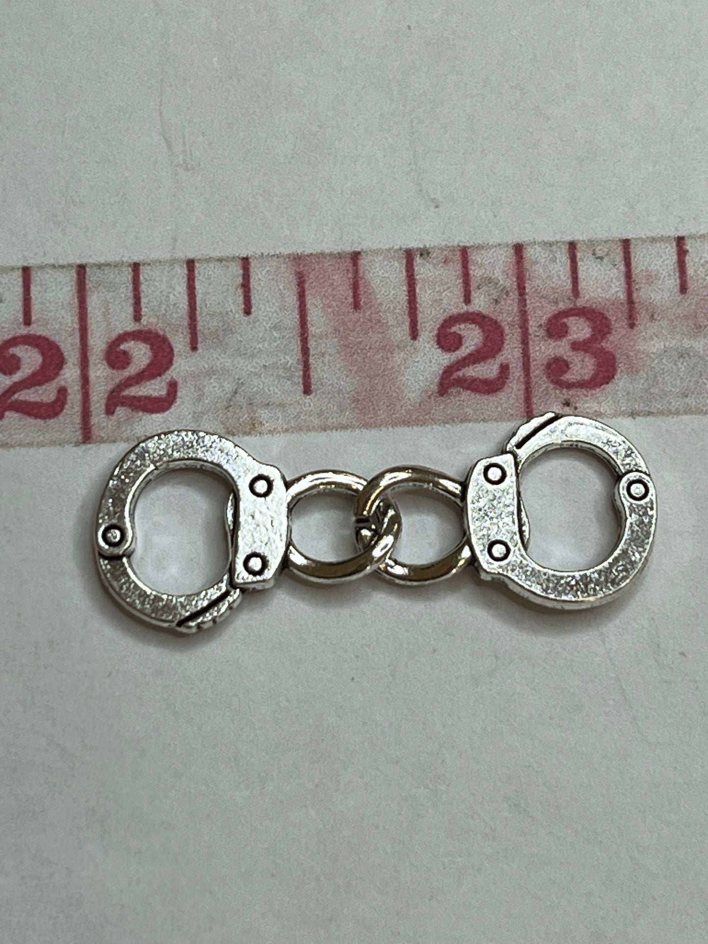 Silver cuffs charms