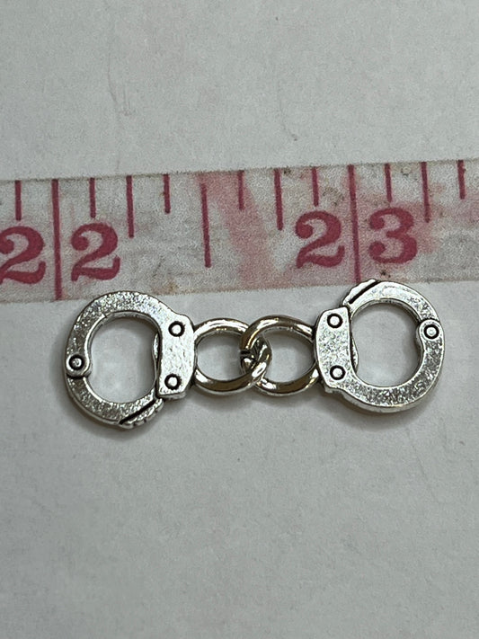 Silver cuffs charms