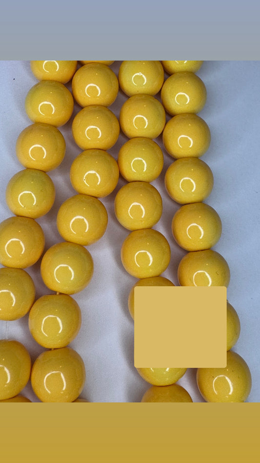 Yellow glass beads