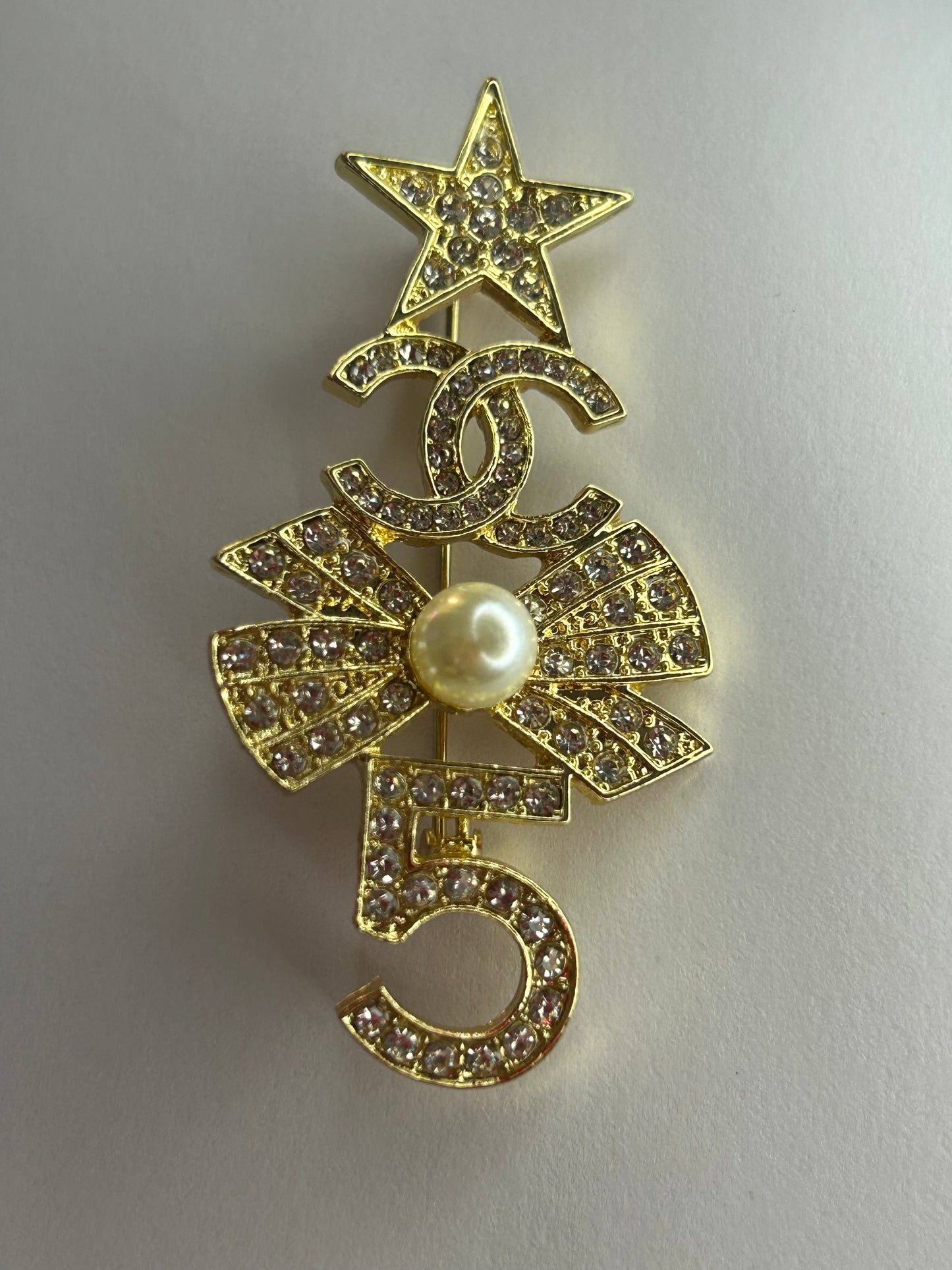 Brooches (gold)