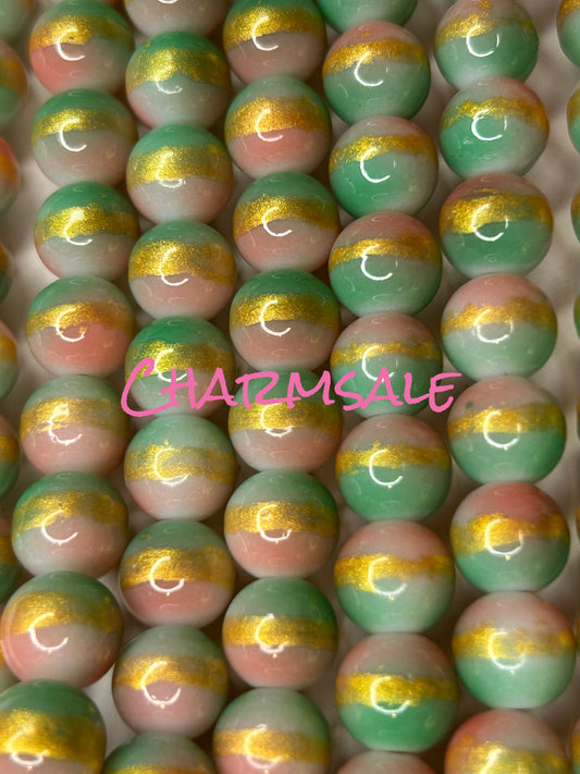 10mm pink green and gold stripe glass beads
